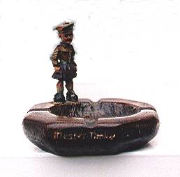 carved wooden Ashtray depicting Cameron Highlander