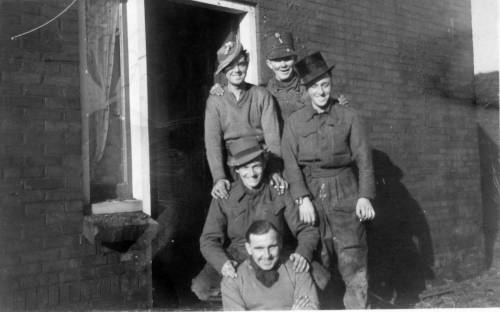 5th Camerons wearing assorted hats for a bit of light-hearted fun.