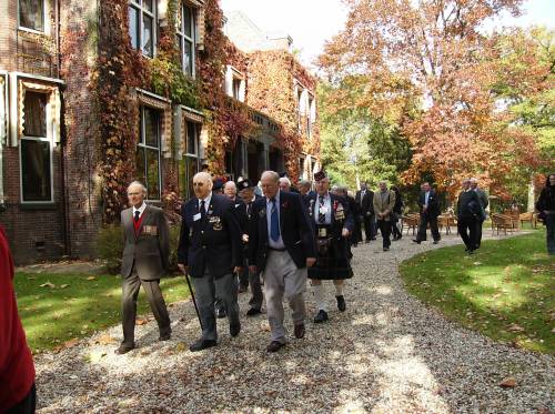 51st Highland Division veterans march to their farewell lunch at Huize Bergen, Vught.