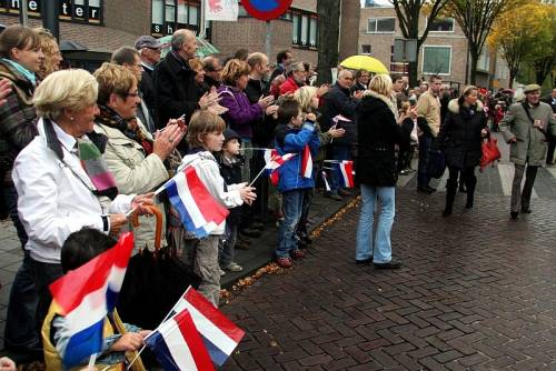 The people of Vught line the streets to greet the 51st Highland Division veterans on their parade of honour