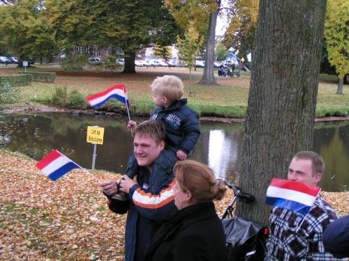The citizens of Vught line the streets to greet and thank the 51st Highland Division veterans on their parade of honour
