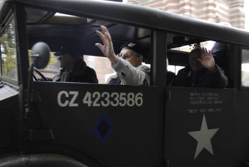 Walter Wright (front) and Peter de Graeve (rear) Derbyshire Yeomanry, 51st Highland Division veterans in a ww2 truck, Vught Holland October 2009