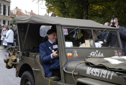 Ronald Titterton, Derbyshire Yeomanry, 51st Highland Division reconnaissance regiment veteran travels in a jeep on the parade of honour, Vught Holland, October 2009
